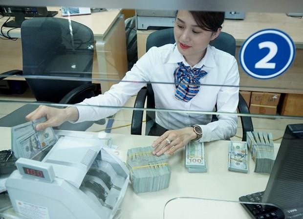 Ảnh minh họa. (Nguồn: LienVietPostBank) Chiến tranh thương mại Mỹ-Trung: Những áp lực lên tỷ giá ảnh 1