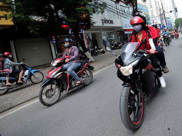 An Giang: Tạm dừng thu phí sử dụng đường bộ xe môtô từ 1/1/2016 ảnh 1