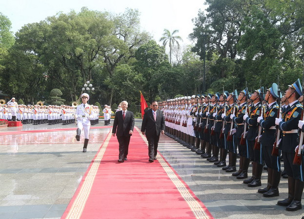 Tổng Bí thư, Chủ tịch nước Lào thăm hữu nghị chính thức Việt Nam ảnh 1