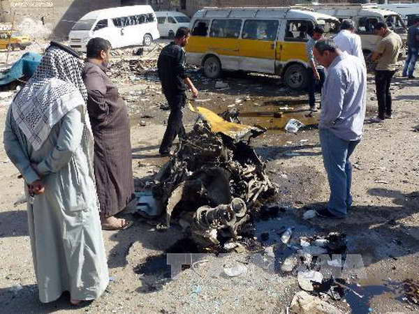 Hiện trường một vụ đánh bom tại Baghdad. Ảnh minh họa. (Nguồn: AFP/TTXVN) Bạo lực đẫm máu tại Iraq, gần 40 người thương vong ảnh 1