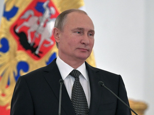 Tổng thống Nga Vladimir Putin tại một sự kiện ở Moskva ngày 9/12. (Nguồn: AP/TTXVN) Tổng thống Putin: Nga-Trung Quốc có cấp độ tin tưởng cao ảnh 1