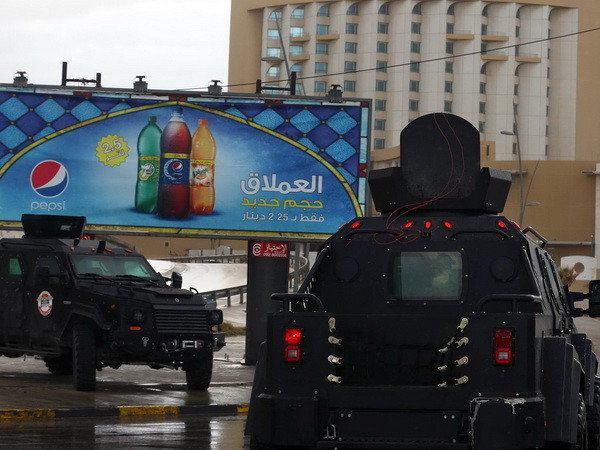 Libya: Các tay súng kích nổ tự sát trong khách sạn ở Tripoli ảnh 1