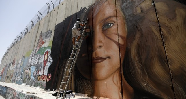 Cảnh sát Israel bắt giữ các nghệ sỹ người Italy ở khu Bờ Tây ảnh 1