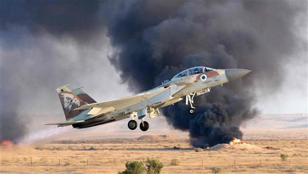 Máy bay chiến đấu F-15 của Israel. (Nguồn: AFP) Quân đội Israel giao tranh với các tay súng tại biên giới Syria ảnh 1