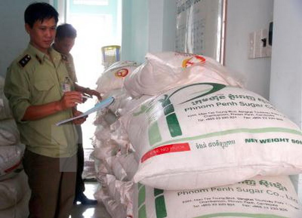 35 năm tù cho 8 bị cáo buôn lậu đường từ Campuchia về Việt Nam ảnh 1