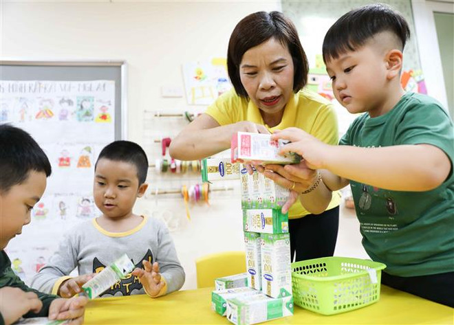 Học sinh trường mẫu giáo Mầm non A, quận Hoàn Kiếm. (Ảnh: Thanh Tùng/TTXVN) Hà Nội hỗ trợ học phí cho học sinh: Chủ trương nhân văn, thiết thực ảnh 2