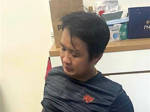 Đối tượng Nguyễn Vũ Anh Tuấn. (Ảnh: TTXVN phát) Triệt phá đường dây số đề quy mô lớn chỉ nhận ghi số qua... iPhone ảnh 1