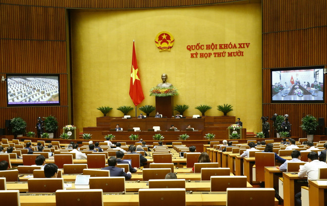 Quang cảnh phiên họp chiều 21/10. (Ảnh: Doãn Tấn/TTXVN) Xác định rõ vai trò chủ trì, phối hợp trong Luật Biên phòng Việt Nam ảnh 1