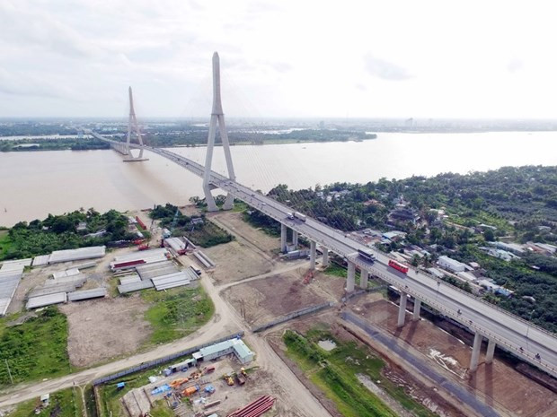 Cầu Cần Thơ vượt qua sông Hậu nối liền giữa tỉnh Vĩnh Long và thành phố Cần Thơ. (Nguồn: TTXVN) Cầu Cần Thơ 2 sẽ được đầu tư xây dựng trong giai đoạn 2026-2030 ảnh 1