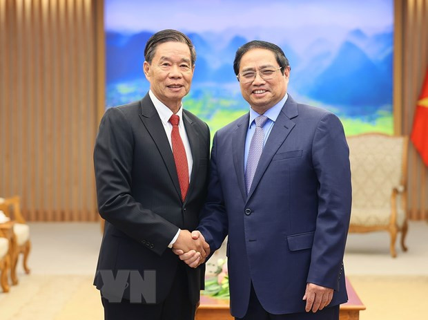 Thủ tướng Phạm Minh Chính tiếp ông Sinlavong Khoutphaythoune, Chủ tịch Ủy ban Trung ương Mặt trận Lào xây dựng đất nước. (Ảnh: Dương Giang/TTXVN) Thủ tướng: Việt Nam luôn quyết tâm kề vai sát cánh, hỗ trợ Lào ảnh 2
