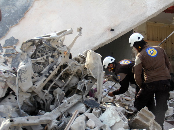Cảnh đổ nát do xung đột giữa quân Chính phủ Syria và lực lượng nổi dậy tại Kfar Jales, ngoại ô tỉnh Idlib ngày 16/11. (Nguồn: AFP/TTXVN) Ngoại trưởng Nga-Mỹ thảo luận về Syria bên lề hội nghị APEC ảnh 1