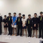 Các đối tượng bị Công an tỉnh An Giang bắt giữ. (Ảnh: TTXVN phát)