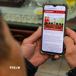 Nhân dân Thủ đô theo dõi Lễ khai mạc Đại hội XIV của Đảng