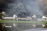 Hiện trường đám cháy vụ da giày tại thôn Đông Tiến, xã Chấn Hưng, thành phố Hải Phòng sáng 14/12. (Ảnh: Hoàng Ngọc/TTXVN)