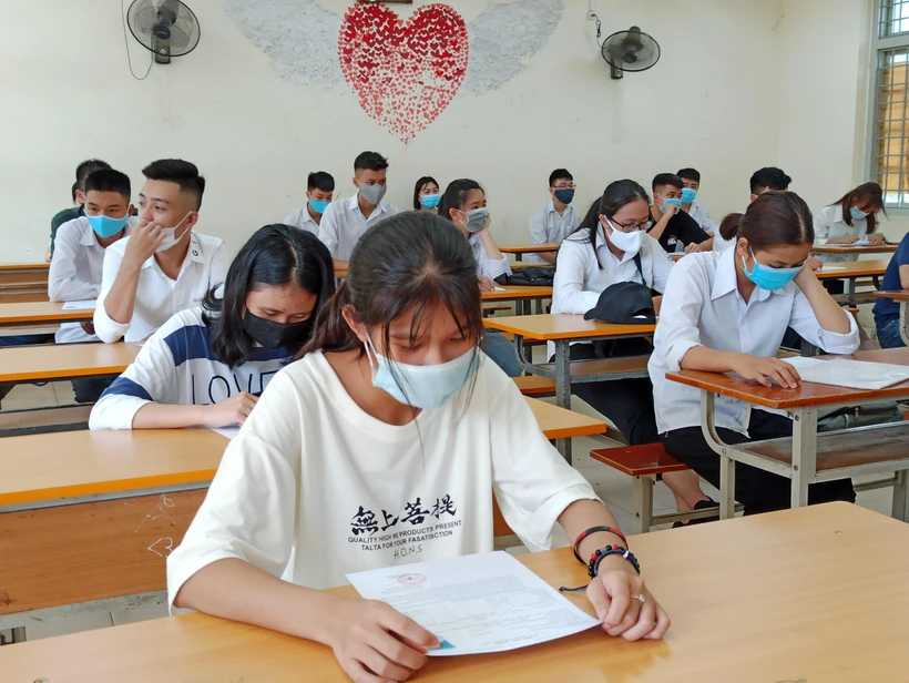 Thí sinh dự thi Trung học phổ thông quốc gia năm 2021. (Ảnh: Phạm Mai/Vietnam+)