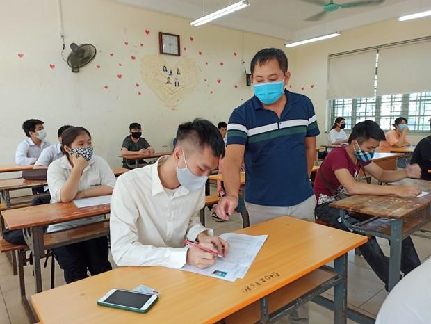 Thí sinh dự thi tốt nghiệp trung học phổ thông năm 2020. (Ảnh: Phạm Mai/Vietnam+)