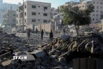 Toà nhà bị phá hủy trong xung đột tại phía Tây thành phố Gaza. (Ảnh: THX/TTXVN)