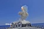 Tên lửa hành trình Tomahawk được phóng từ tàu khu trục USS Barry của Mỹ trên Địa Trung Hải. (Ảnh minh họa. AFP/TTXVN)
