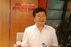 Bộ trưởng Bộ Xây dựng Trịnh Đình Dũng cho rằng, phát triển nhà ở xã hội rất cần các biện pháp quyết liệt để huy động nguồn lực xã hội. (Ảnh: PV/Vietnam+)