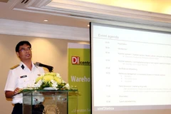Ông Bùi Hải Quân, giám đốc Công nghệ thông tin (Tổng Công ty Tân Cảng Sài Gòn) chia sẻ triển khai thành công giải pháp WMSVN. (Ảnh: CTV/Vietnam+)