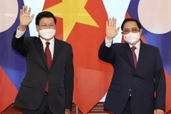 Thủ tướng Phạm Minh Chính hội kiến với Tổng Bí thư, Chủ tịch nước Lào