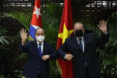 [Photo] Chủ tịch nước Nguyễn Xuân Phúc hội kiến Thủ tướng CH Cuba
