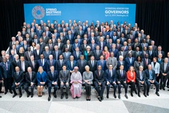 Các đại biểu chụp ảnh lưu niệm tại Hội nghị mùa Xuân của Quỹ Tiền tệ quốc tế (IMF) và Ngân hàng Thế giới (WB) diễn ra ở Washington (Mỹ), ngày 13/4. (Ảnh: AFP/TTXVN) 