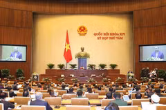Thủ tướng Chính phủ Nguyễn Xuân Phúc trình bày Báo cáo về kết quả thực hiện kế hoạch phát triển kinh tế - xã hội năm 2019; kế hoạch phát triển kinh tế-xã hội năm 2020. (Ảnh: Dương Giang/TTXVN)