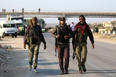 Các tay súng nổi dậy tại khu vực Morek, Syria. (Ảnh: AFP/TTXVN)