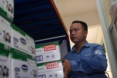 Các sản phẩm sữa của Vinamilk đều đảm bảo tiêu chuẩn chất lượng. (Ảnh: Thanh Tùng/TTXVN)