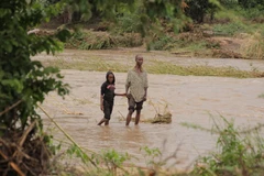 Cảnh ngập lụt do ảnh hưởng của bão Idai tại tỉnh Manicaland, Zimbabwe, ngày 17/3. (Ảnh:THX/TTXVN) 