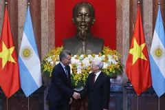 Tổng Bí thư, Chủ tịch nước Nguyễn Phú Trọng và Tổng thống Argentina Mauricio Macri. Ảnh: Lâm Khánh/TTXVN)