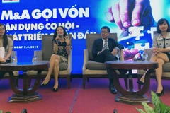 Các chuyên gia, doanh nghiệp chia sẻ kinh nghiệm trong lĩnh vực M&A. (Ảnh: Mỹ Phương/TTXVN)