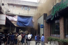 Hiện trường vụ cháy quán bar. (Ảnh: Doãn Tấn/TTXVN)