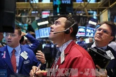 Tại phiên giao dịch ở thị trường chứng khoán New York, Mỹ. (Ảnh: AFP/TTXVN)