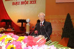 Tổng Bí thư Nguyễn Phú Trọng đọc Báo cáo của Ban Chấp hành Trung ương Đảng khóa XI về các văn kiện trình Đại hội XII của Đảng. (Nguồn: TTXVN)