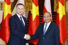 Thủ tướng Nguyễn Xuân Phúc hội kiến Tổng thống Cộng hòa Ba Lan Andrzej Duda. (Ảnh: Thống Nhất/TTXVN)