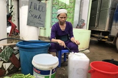 Một điểm bán nước sinh hoạt của người dân thành phố Sơn La. (Ảnh: Hữu Quyết/TTXVN)