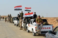 Các lực lượng Iraq tiến vào khu vực Anna, tỉnh Anbar trong chiến dịch chống IS ngày 19/9. (Nguồn: AFP/TTXVN)