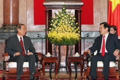 Chủ tịch nước Trương Tấn Sang tiếp Bộ trưởng, Chủ nhiệm Văn phòng Chủ tịch nước Lào Phongsavath Boupha. (Ảnh: Nguyễn Khang/TTXVN)