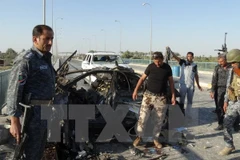 Hiện trường một vụ đánh bom tại Iraq. (Nguồn: AFP/TTXVN)