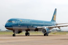 Máy bay của Vietnam Airlines chuẩn bị cất cánh tại sân bay quốc tế Nội Bài (Hà Nội). (Ảnh: Huy Hùng/TTXVN)