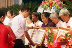 Thanh Hóa phong tặng, truy tặng danh hiệu Bà mẹ Việt Nam Anh hùng. (Ảnh: Thanh Tùng/TTXVN) 