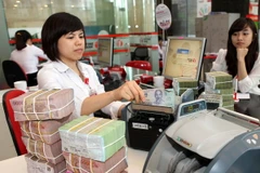 Mức thưởng Tết Ất Mùi 2015 trung bình 5 triệu đồng mỗi người