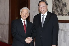 Tổng Bí thư hội kiến với Chủ tịch Chính hiệp Trung Quốc 