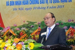 Phó Thủ tướng Nguyễn Xuân Phúc phát biểu tại buổi lễ. (Ảnh: Trọng Đức/TTXVN)