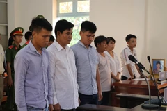 Ba bị cáo gồm Nguyễn Phước Thuận, Nguyễn Minh Huân và Châu Minh Nhựt. (Ảnh: Bùi Giang/TTXVN)