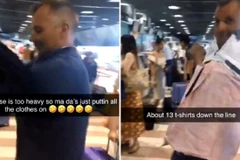 Đoạn video quay cảnh John Irvine mặc 8kg quần áo lên người được đăng trên Twitter. (Ảnh: The Sun)