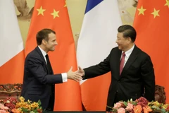 Chủ tịch Trung Quốc Tập Cận Bình và Tổng thống Pháp Emmanuel Macron. (Ảnh: Reuters)