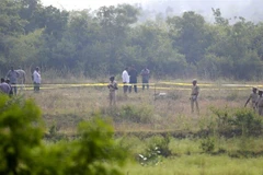 Cảnh sát Ấn Độ điều tra vụ sát hại 4 nghi can. (Ảnh: AP)